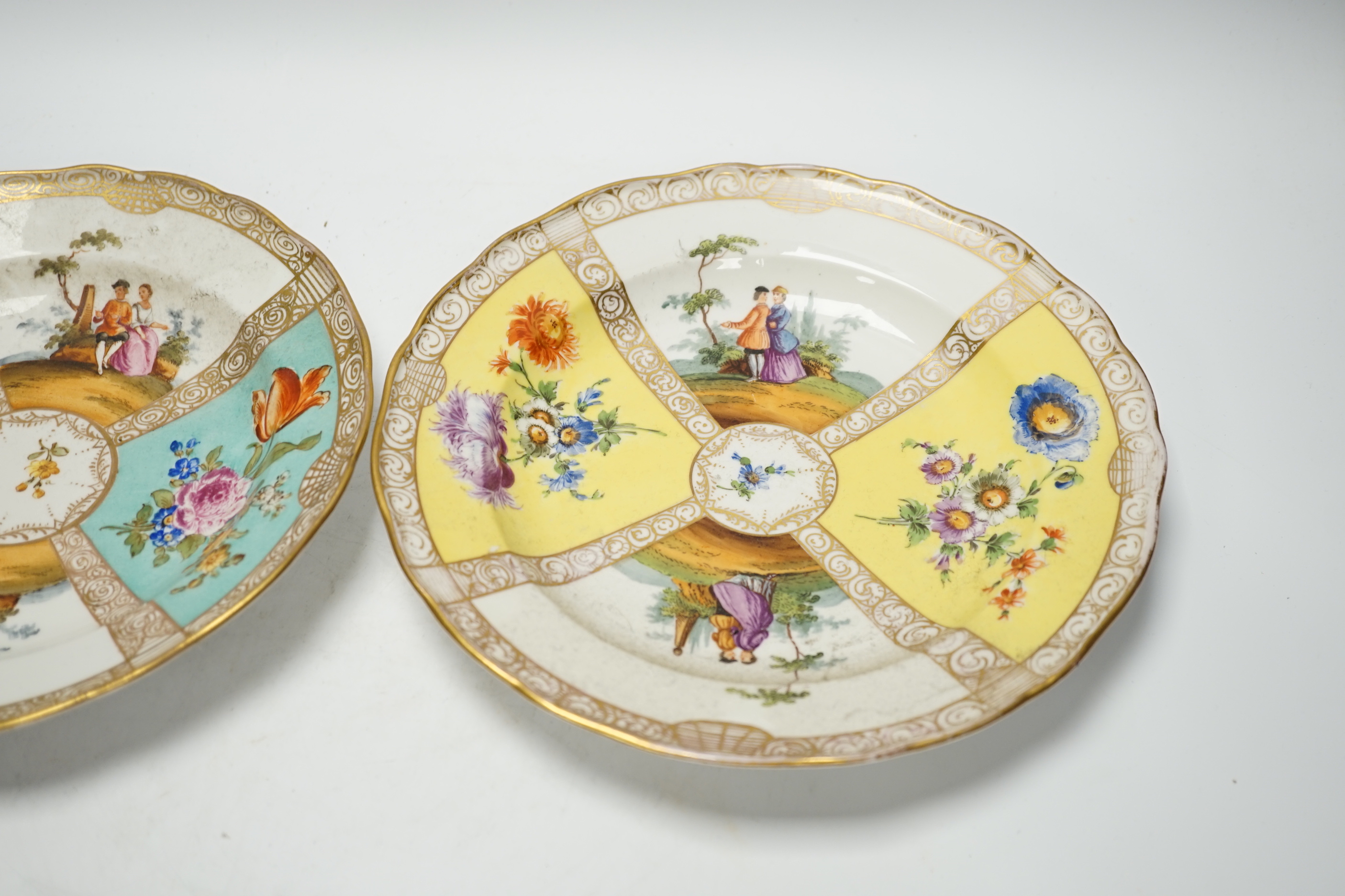 Three Meissen outside figurative and floral decorated plates, 23.5cm diameter